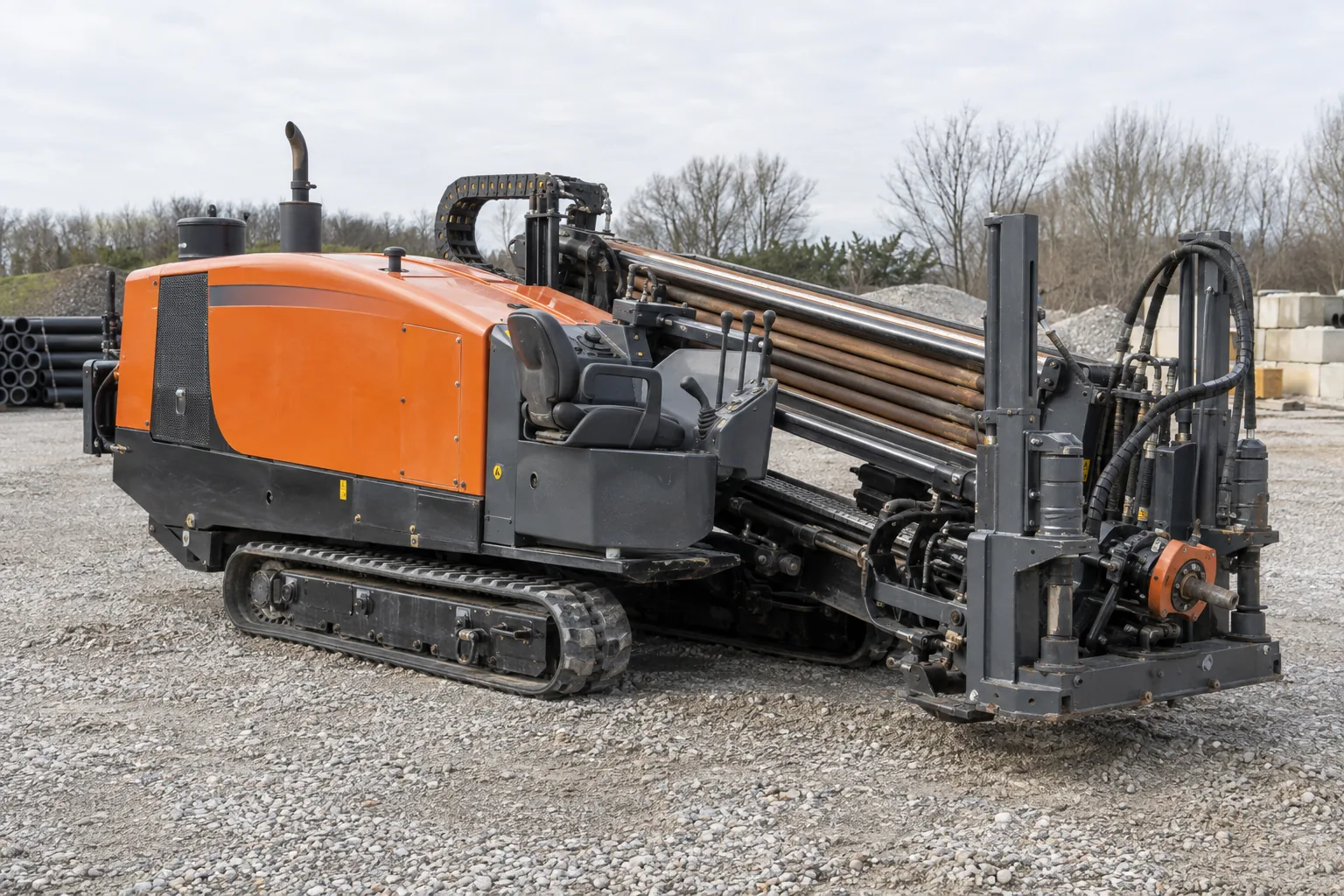 Tracked horizontal directional boring machine in a contractor yard